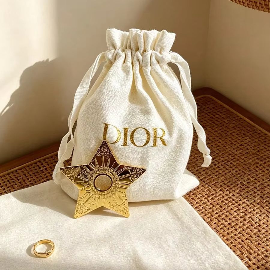 Dior Off‑White Canvas Drawstri - огляд і ціна Luxury Bags Dior